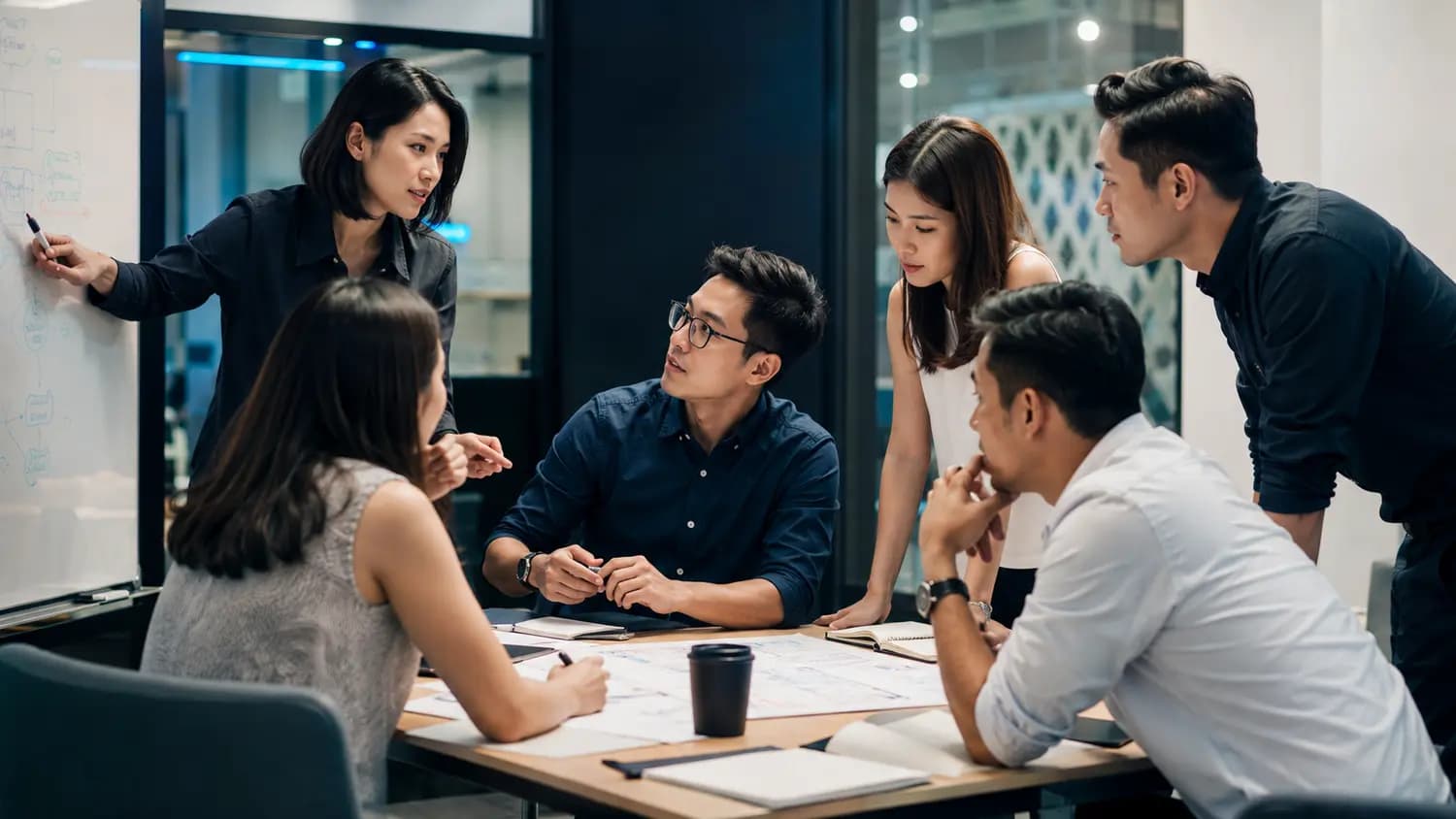 Technology consultants collaborating on delivery